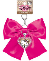 Elevate your everyday style with our Glam Hello Kitty Satin Bow Keychain in hot pink! This elegant accessory perfectly combines Sanrio's iconic charm with glam design elements. The stunning hot pink satin bow is complemented by a special centerpiece; a sparkling Hello Kitty acrylic charm that adds an extra touch of kawaii flair. Built with quality in mind, this keychain features a durable metal attachment that makes it perfect for your keys, bags, or starting your Sanrio collection.